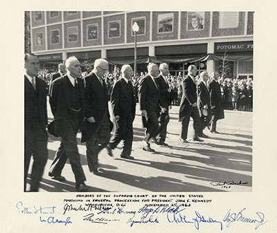 From left to right: Justices Potter Stewart, John M. Harlan II, Chief Justice Earl Warren, Justices Hugo L. Black, William O. Douglas, Tom C. Clark, Byron R. White, Arthur J. Goldberg and William J. Brennan, Jr. marching in the funeral procession of President John F. Kennedy, November 25, 1963.